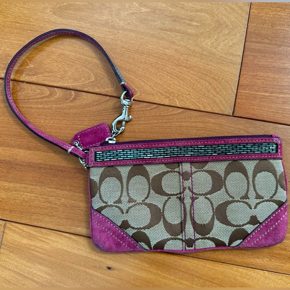 Vintage Coach signature tan fabric burgundy suede wristlet. Small bag.